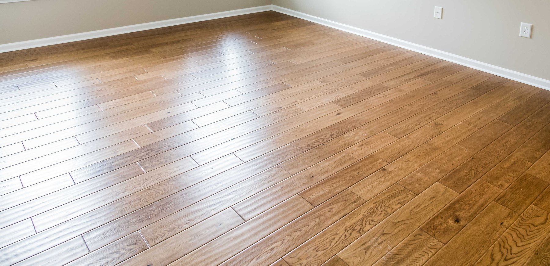 Hardwood flooring in a bright open concept interior