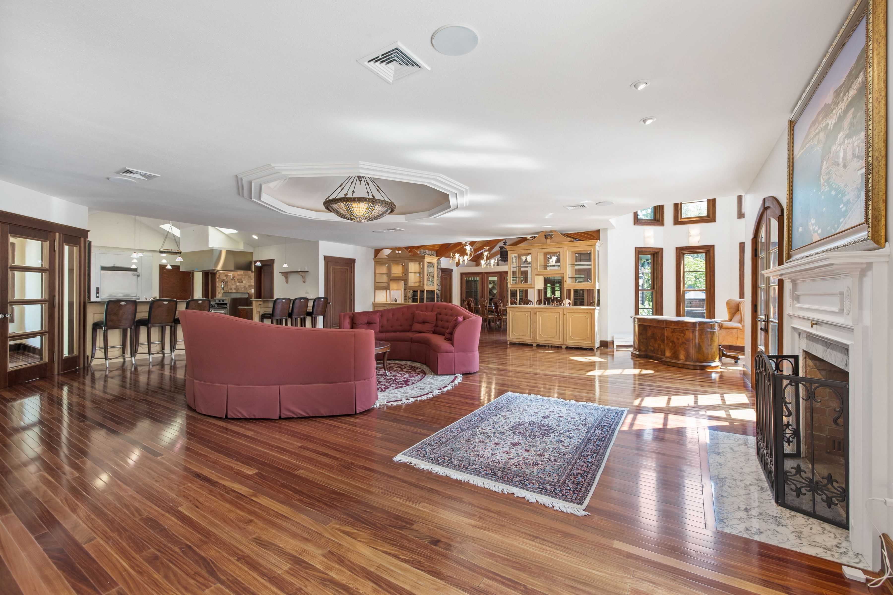 Hardwood flooring in a large open living room